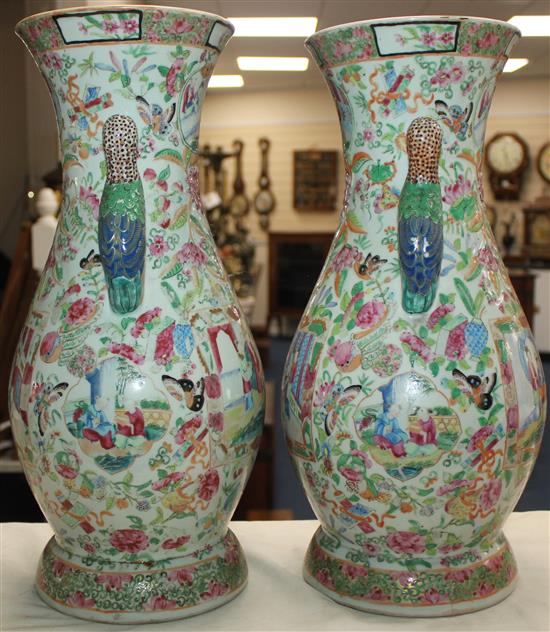 A pair of unusual Chinese Canton-decorated vases, 19th century, 44cm, bases repaired